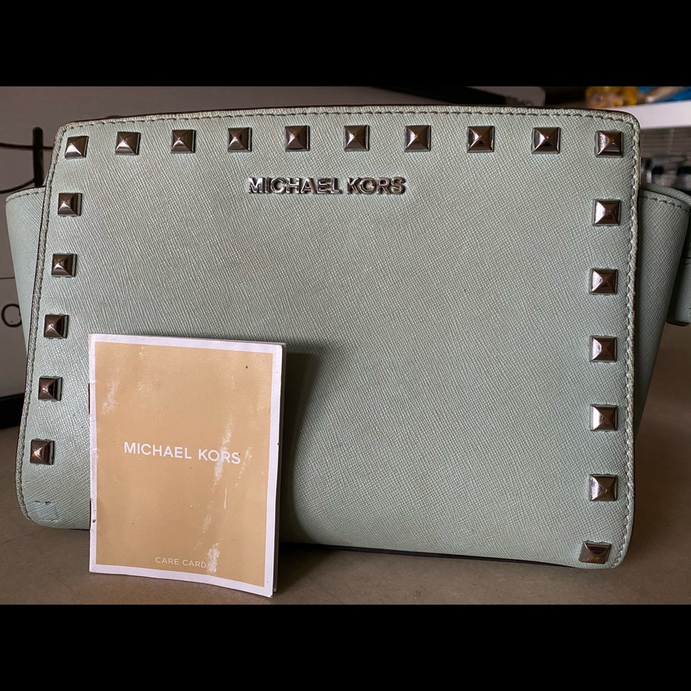 Michael Kors light blue studded crossbody.